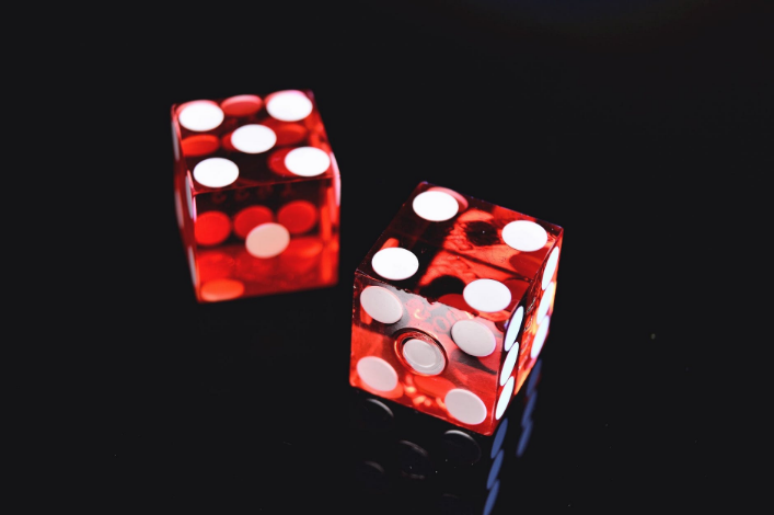 two red dices on the table